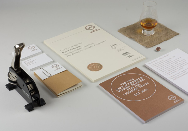 Logo and print with copper print and blind emboss details designed by O Street for Whisky Ambassador Logo and print with copper print and blind emboss details designed by O Street for Whisky Ambassador