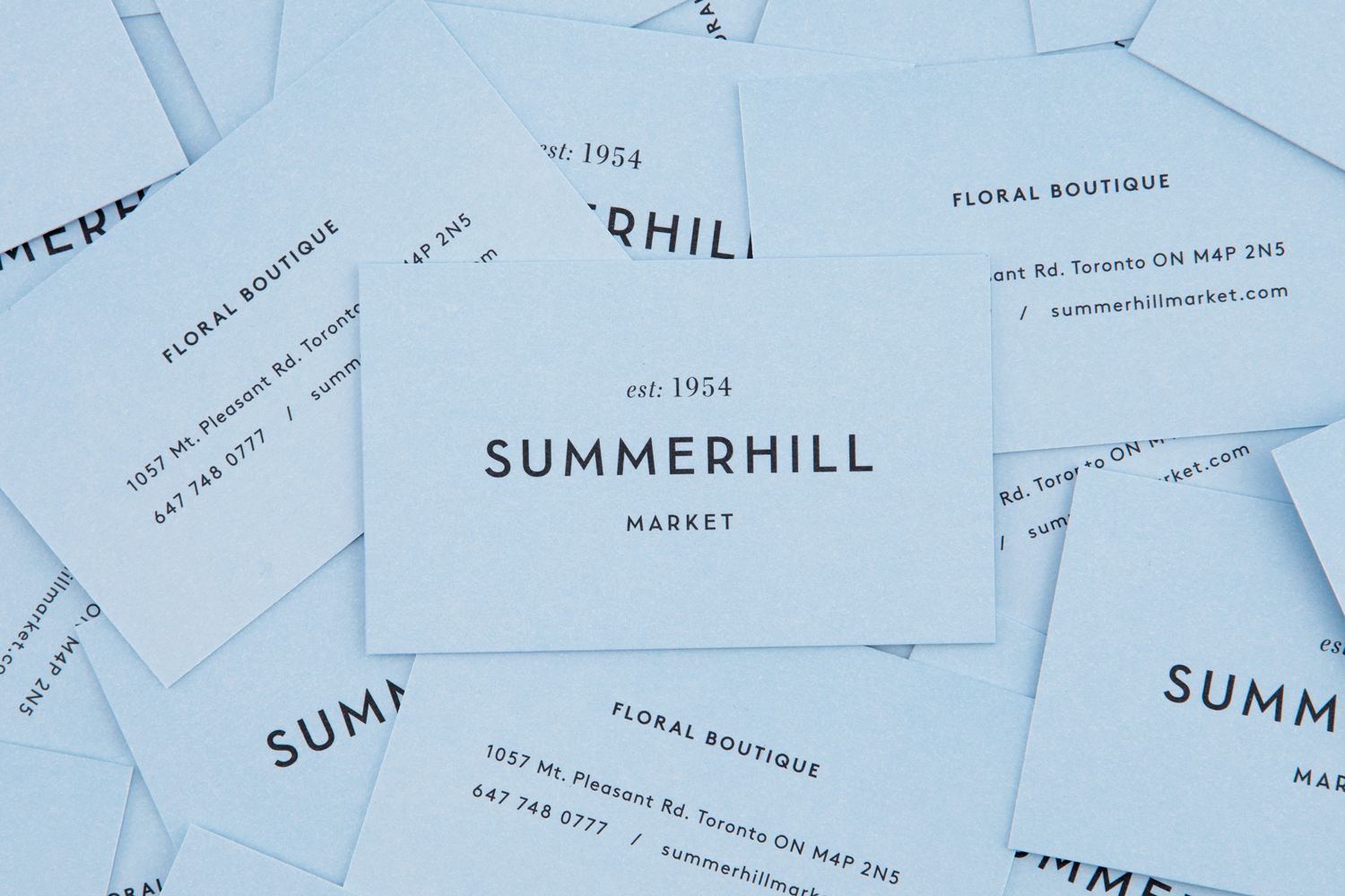 Brand identity and business cards designed by Canadian studio Blok for Toronto based boutique grocery store Summerhill Market