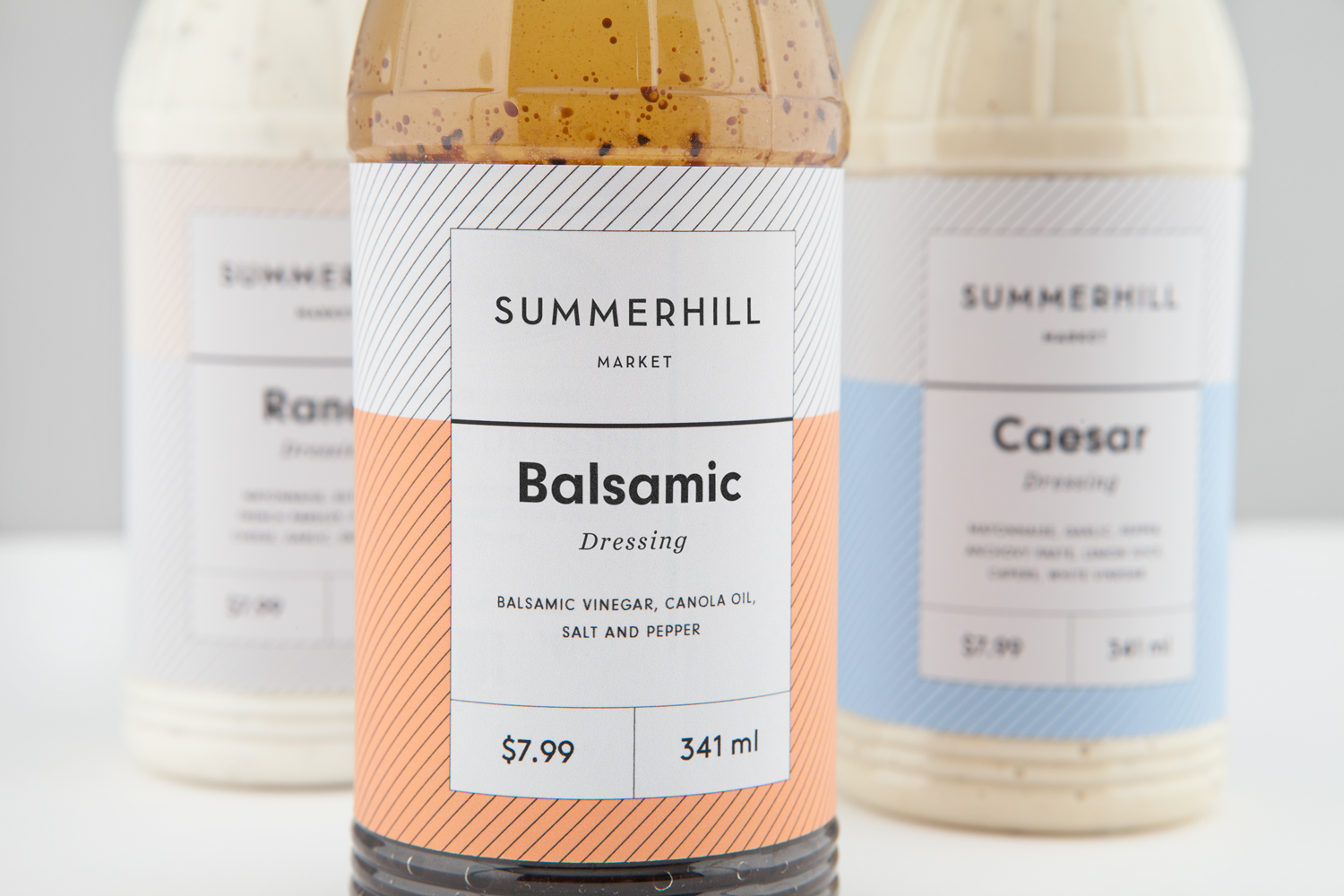 Branding and salad dressing packaging designed by Canadian studio Blok for Toronto based boutique grocery store Summerhill Market