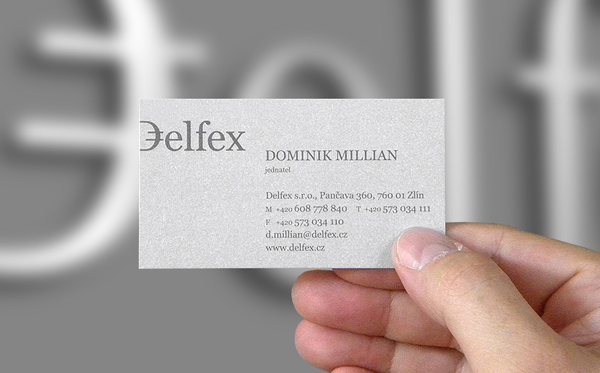 Logo and silver metallic business card designed by Jan Zabransky for currency trading and consulting business Delfex