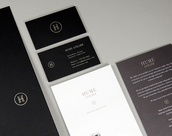 Logo and stationery with black board and silver foil detail designed by Glasfurd & Walker for bespoke jewellery design and production studio Hume Atelier