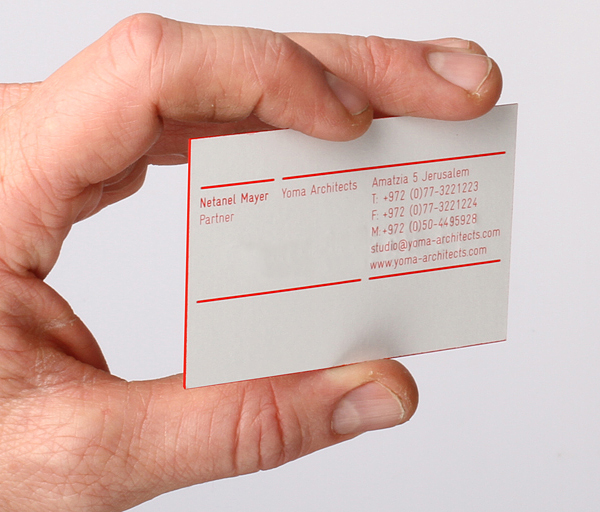 Logo and business card with red edge painted detail designed by Kobi Benezri for Jerusalem-based architecture practice Yoma
