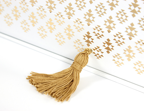 Packaging with gold foil detail designed by Rocío Martinavarro for textile producer Zeri Crafts