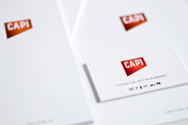 Logo and stationery created by CIP for premium carbonated fruit juice, mixer and mineral water brand CAPI.