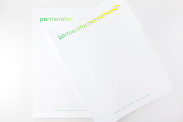 Logo and headed paper with fluorescent yellow and green print treatment created by Blok for Canadian charity Partners For Mental Health