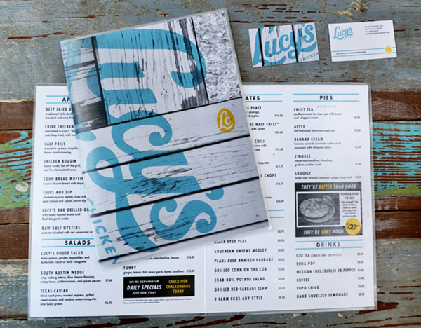 Script logotype and menus designed by Pentagram for Austin based fried chicken and oyster bar/restaurant Lucy's