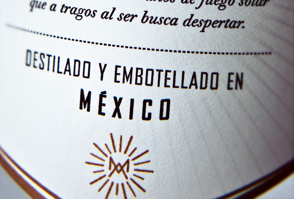 Packaging with metallic copper spot colour detail designed by Butic for Mexican mezcal spirit brand Mezcal Amores