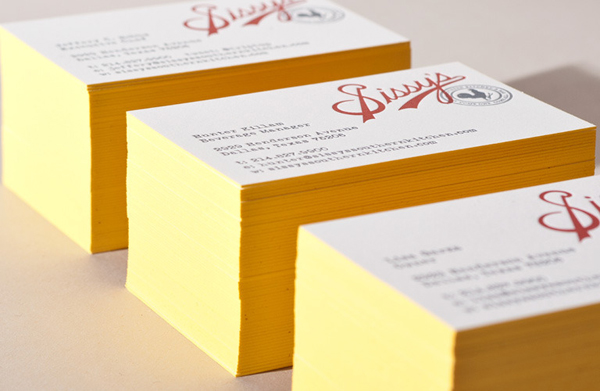 Logotype and yellow edge painted letterpress business cards designed by Tractorbeam for Sissy's Southern Kitchen
