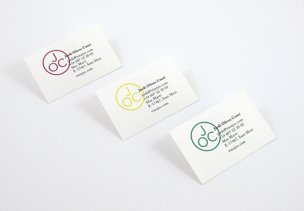 Monogram and business card designed by Francesc Moret for wine range Jordi Oliver Conti