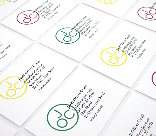 Monogram and business card designed by Francesc Moret for wine range Jordi Oliver Conti