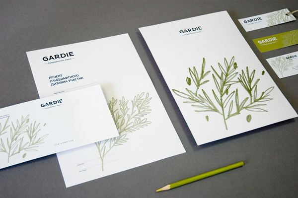 Logo and stationery with hand drawn coloured pencil plant illustrations by Paradox Box for landscaping business Gardie