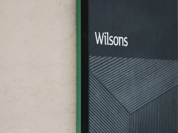 Logo and signage with etched detail by MyttonWilliams for legal advice firm Wilsons