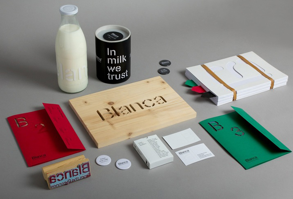 Logo and print with die cut detail for dairy hub Blanca designed by Lo Siento Logo and print with die cut detail for dairy hub Blanca designed by Lo Siento