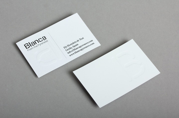 Logo and business card with blind emboss detail for dairy hub Blanca designed by Lo Siento Logo and business card with blind emboss detail for dairy hub Blanca designed by Lo Siento