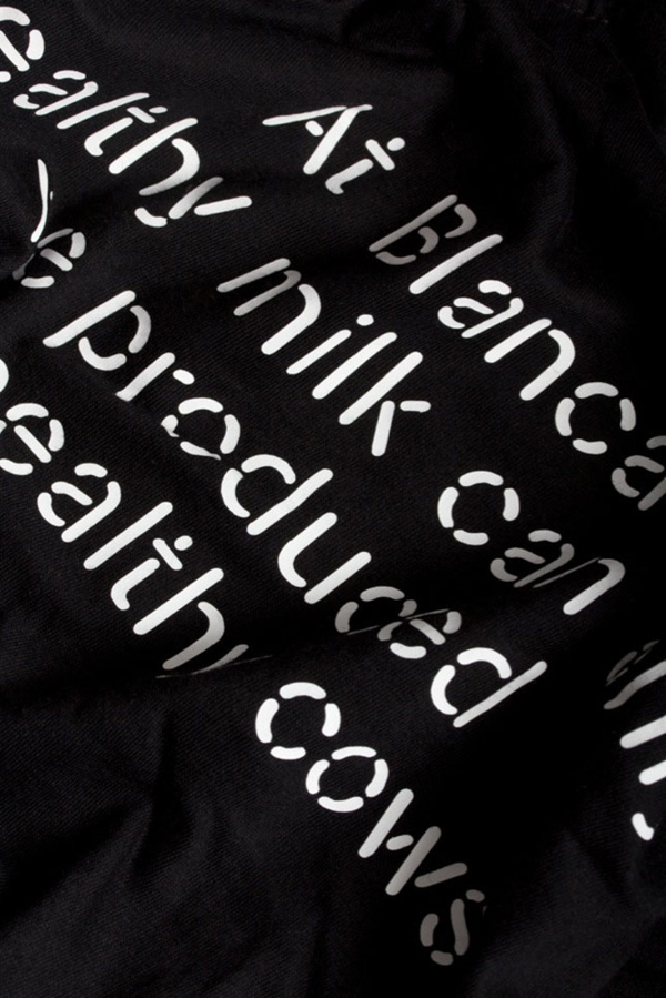 Screen printed T-shirt with stencil cut typographical detail designed by Lo Siento for dairy hub Blanca 