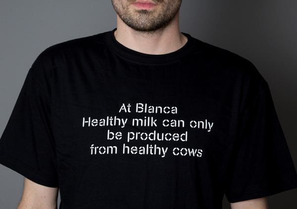 Screen printed T-shirt with stencil cut typographical detail designed by Lo Siento for dairy hub Blanca Screen printed T-shirt with stencil cut typographical detail designed by Lo Siento for dairy hub Blanca