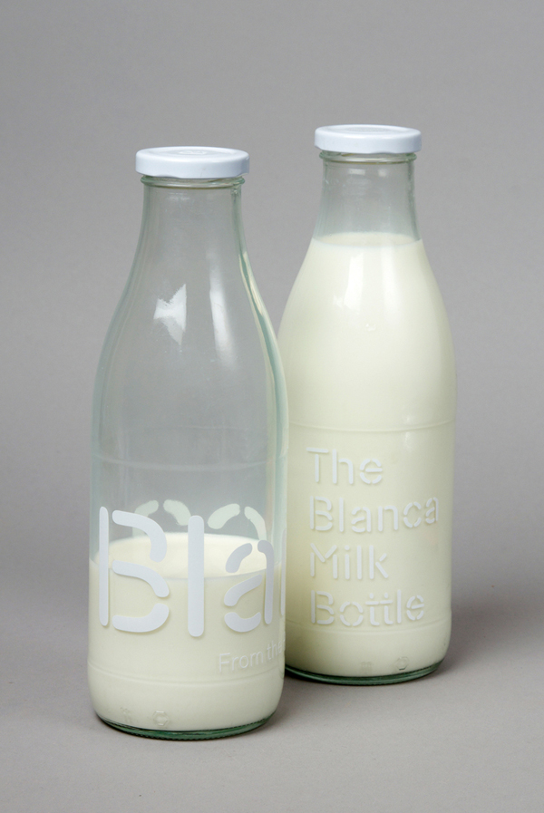 Screen printed milk bottles with stencil cut typographical detail designed by Lo Siento for dairy hub Blanca 