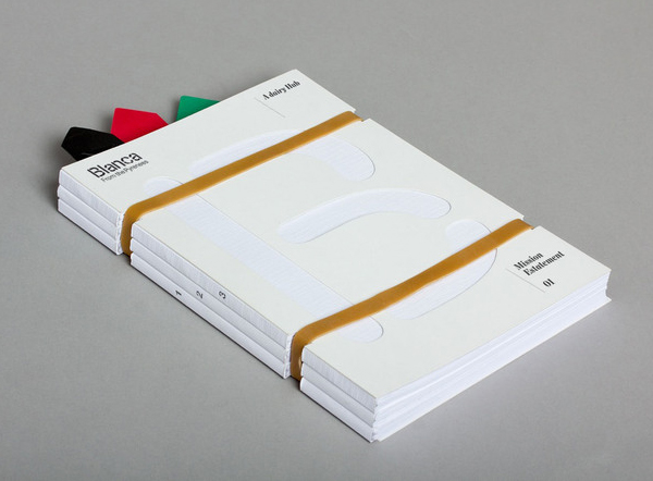 Brochure with rubber band, bookmarks and die cut details designed by Lo Siento for dairy hub Blanca 