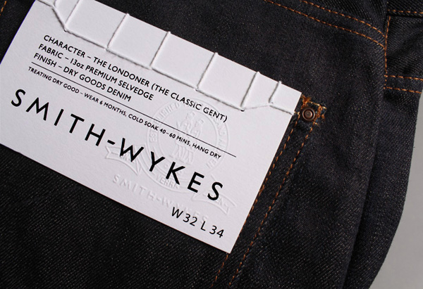 Logo and stitched clothing label for London and Paris-based male fashion brand Smith-Wykes designed by Studio Small