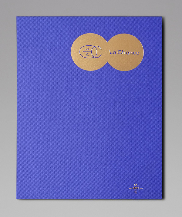 Logo and print with gold foil and blue embossed surface treatment for furniture and lighting company La Chance designed by Artworklove