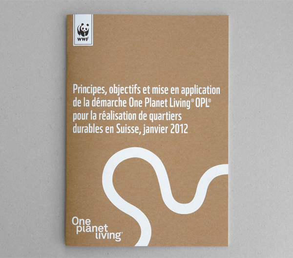 Printed collateral featuring white ink on unbleached substrate for One Planet Living designed by Demian Conrad