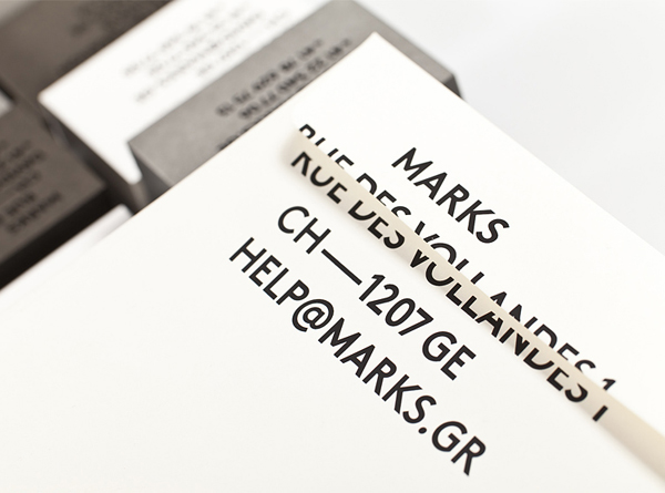 Logo and business cards with black foil detail designed by Marks