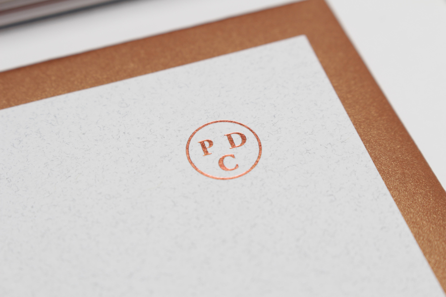 Stationery with copper foil and alabaster paper detail by Passport for interior design consultancy Pure