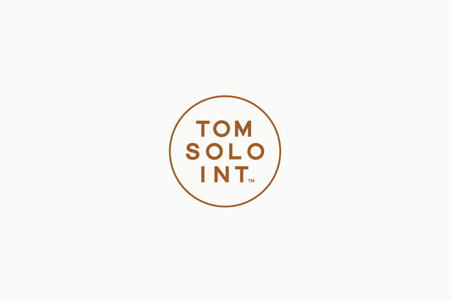 Logo for photographer Tom Solo designed by Mash