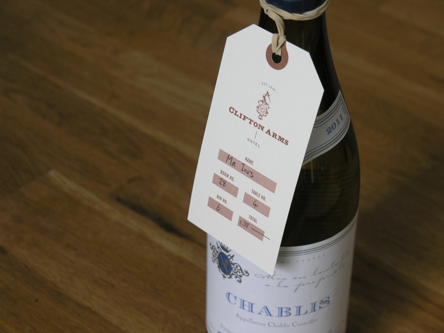 Wine tag with copper ink print treatment designed by Wash for the Clifton Arms Hotel