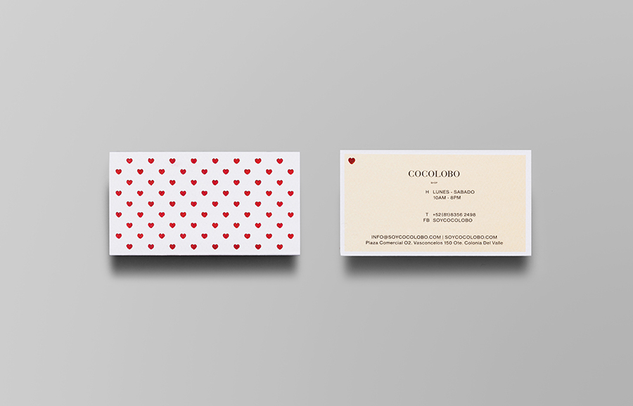 Logo and business card with red foil print finish designed by Anagrama for high-end shopping boutique Cocolobo