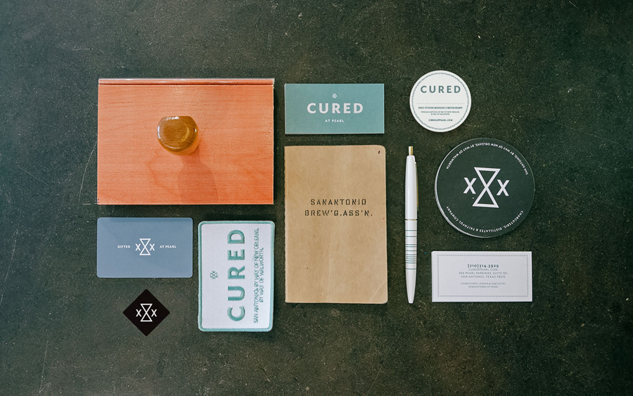 Brand identity and print designed by Föda for San Antonio restaurant Cured