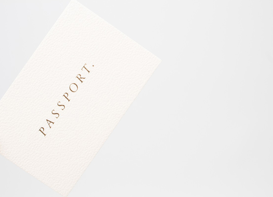 Vellum White Colorplan business cards with gold foil detail for Leeds based design studio Passport