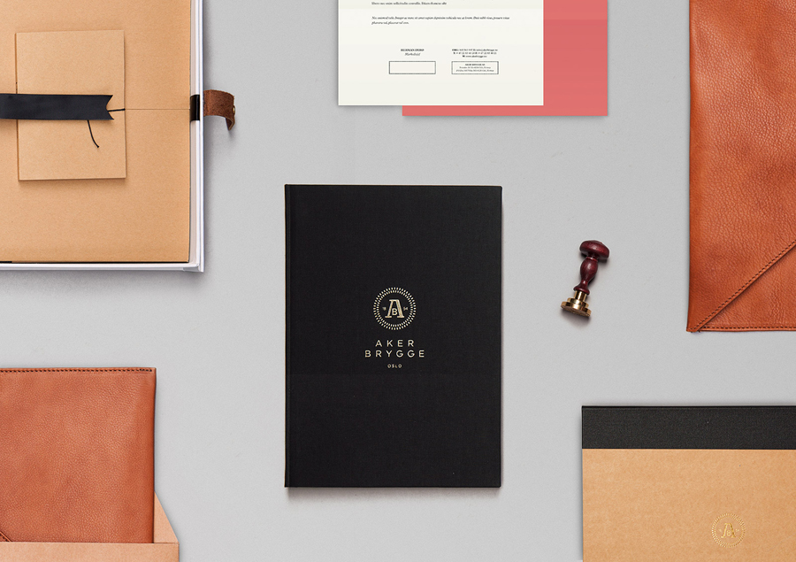 Logo, stationery and accessory design with gold foil detail designed by Bleed for the redevelopment of Oslo waterside district Aker Brygge