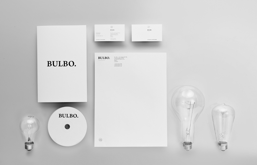 Logo and stationery with silver foil detail for high-end boutique lighting shop and interior planning service Bulbo designed by Anagrama