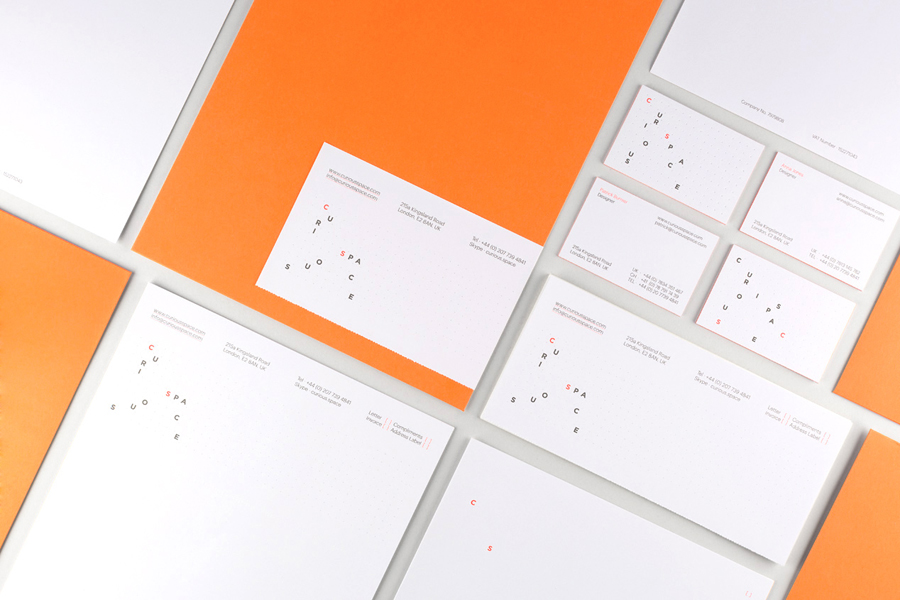 Logo and stationery with fluorescent orange print detail designed by Mash Creative and May Ninth for Curious Space