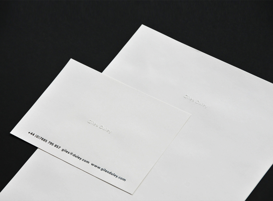 Stationery with blind emboss detail for photographer Giles Duley designed by Shaz Madani