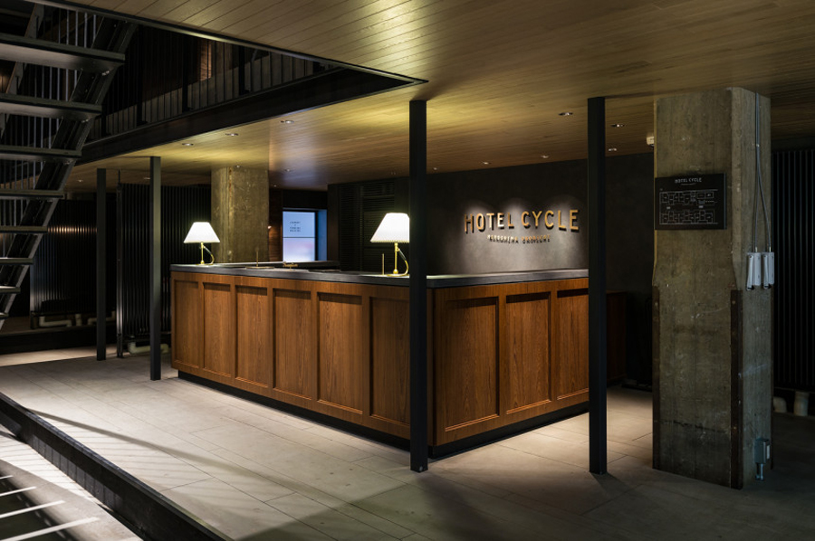 Logotype and interior signage designed by UMA for U2's Onomichi based Hotel Cycle