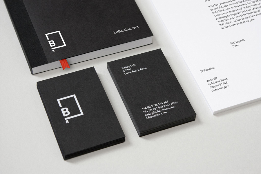 Logo and stationery with black card and white ink detail created by Freytag Anderson for advertising industry guide Little Black Book