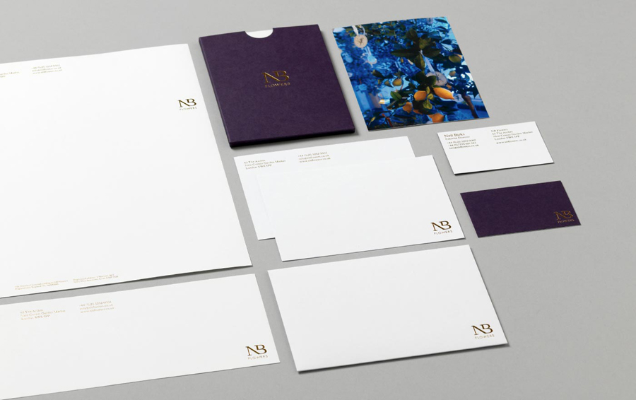 Logo and stationery design for florist NB Flowers by Karoshi