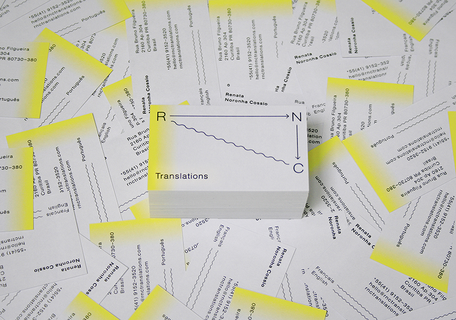 Logo and yellow edge sprayed grey business card designed by Studio Constantine for translator Renata Noronha Cossio