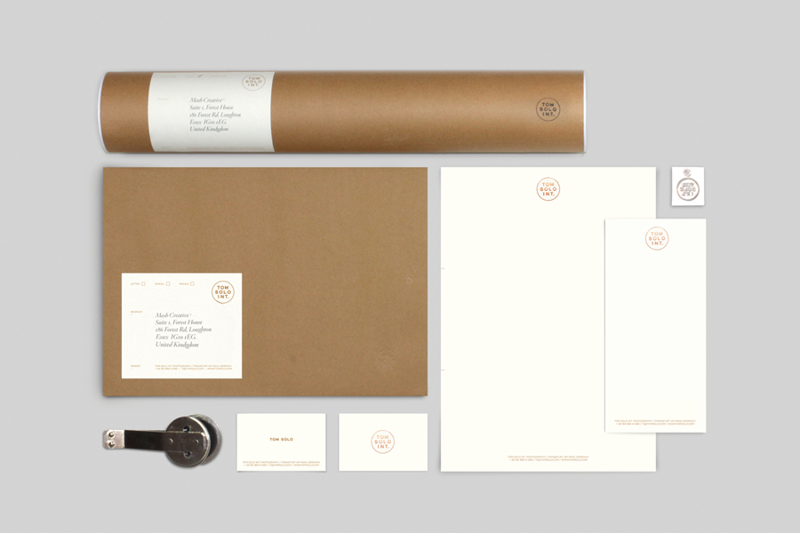 Logo and stationery with copper foil print finish for photographer Tom Solo designed by Mash