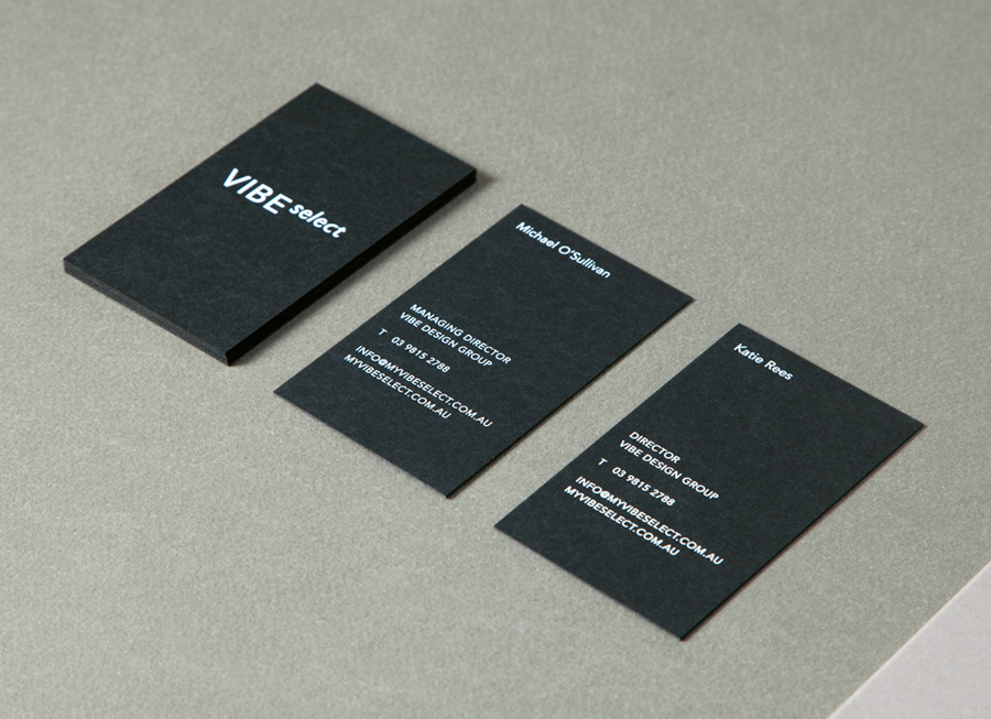 Sans-serif logotype and black board business card with white screen-printed detail for architectural firm Vibe Select designed by Studio Constantine.