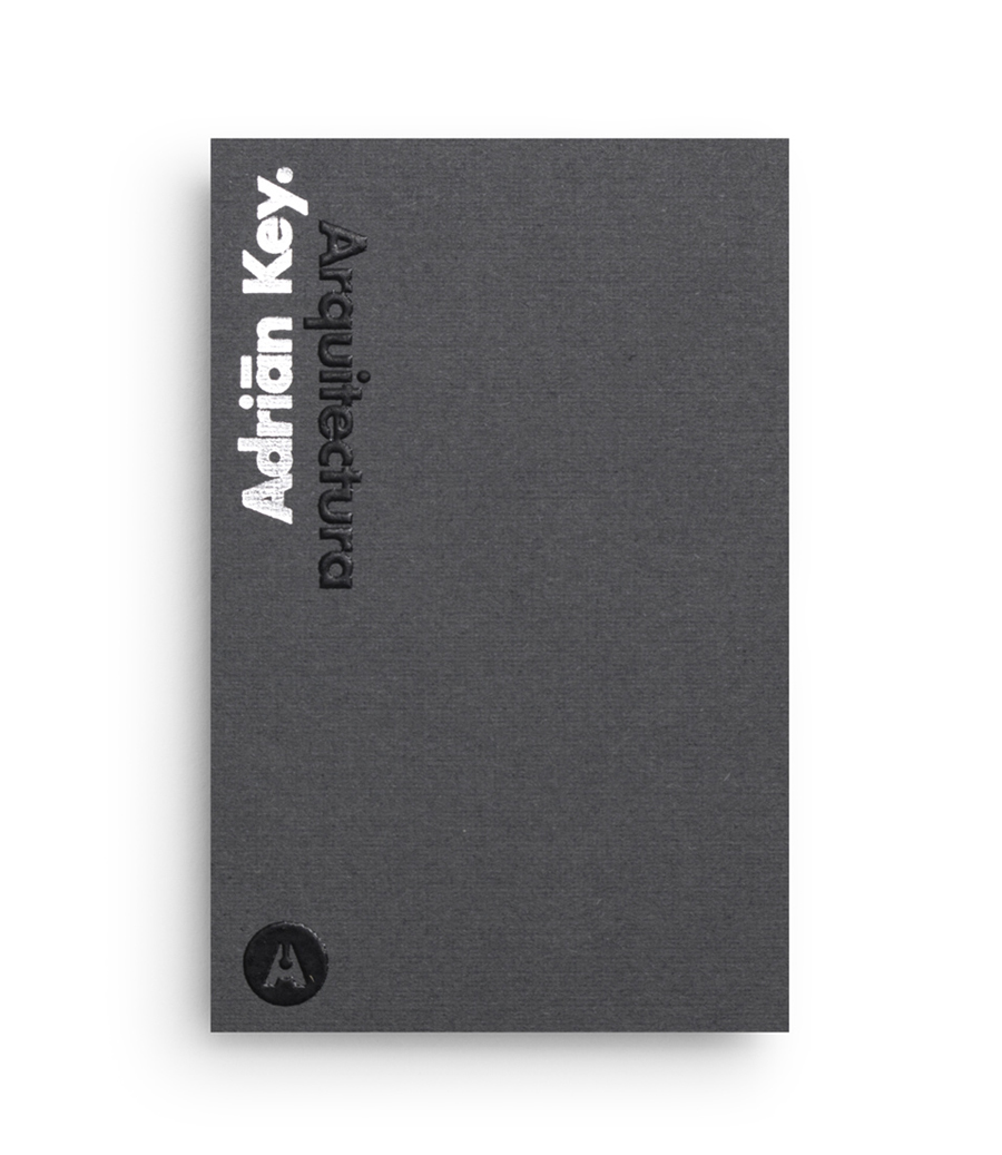 Logo and duplex business card with thermographic ink and silver foil detail designed by Face Creative for MX architecture firm and architect Adrián Key