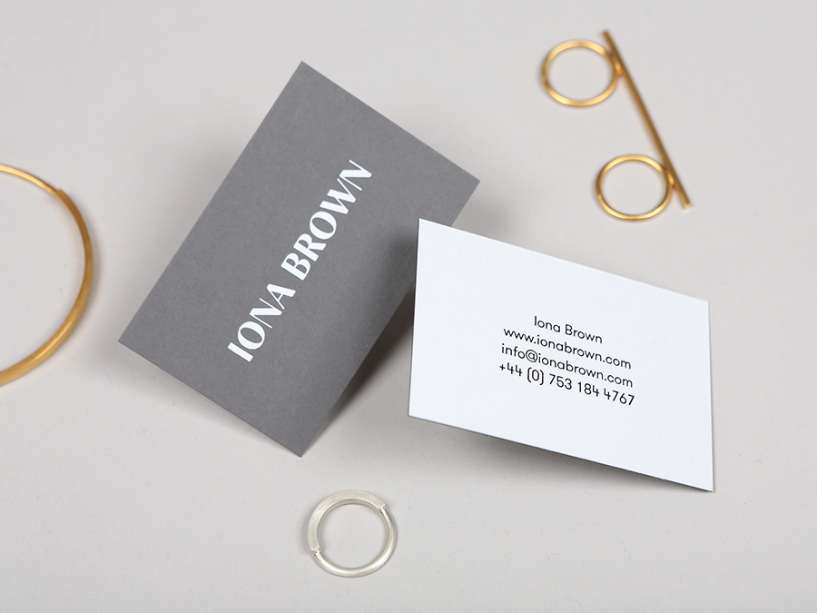 Logotype and business card with white foil detail for contemporary jewellery designer Iona Brown