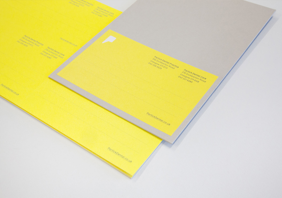 Logo and stationery with yellow paper detail designed by Freytag Anderson for Partick Dental featured on BPO