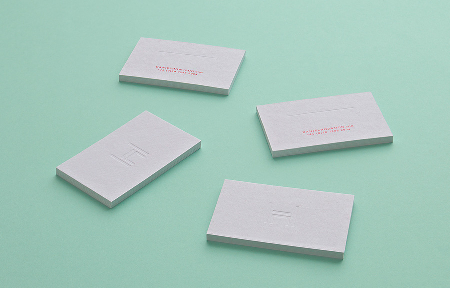 Logo and blind deboss business cards designed by Two Times Elliott for Daniel Hopwood