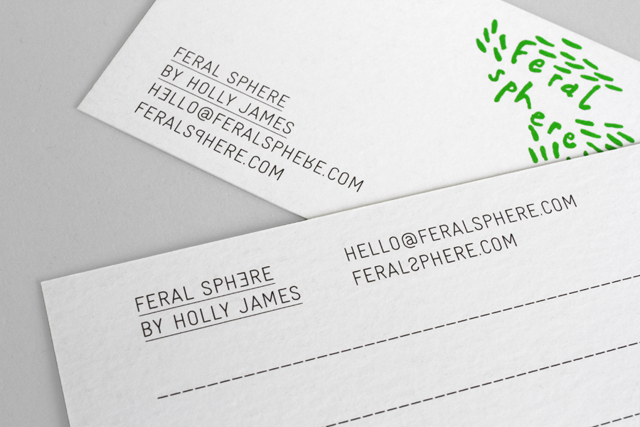 Logo and business card with a bright spot green print finish designed by Mind for fashion label Feral Sphere