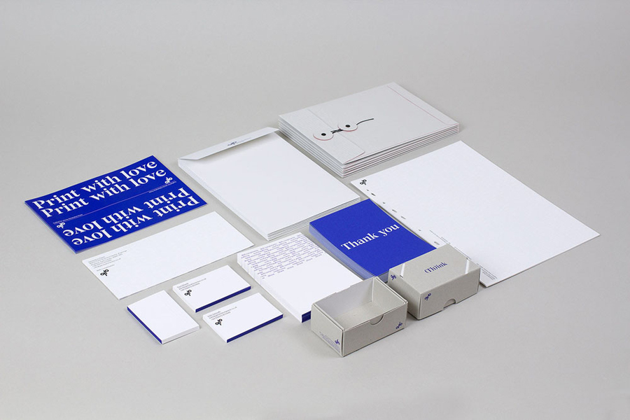 Stationery with blue edge painted detail for print production company Generation Press designed by Build