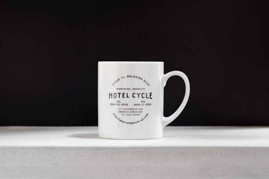 Logotype and mug designed by UMA for U2's Onomichi based Hotel Cycle