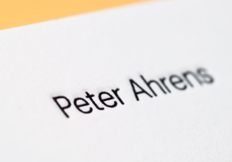 Logotype and letterpress business cards for photographer Peter Ahrens by Studio Jubilee